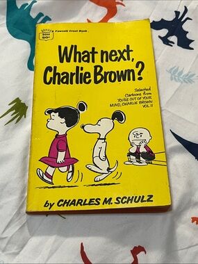What Next, Charlie Brown? Paperback Book - Yellow Cover